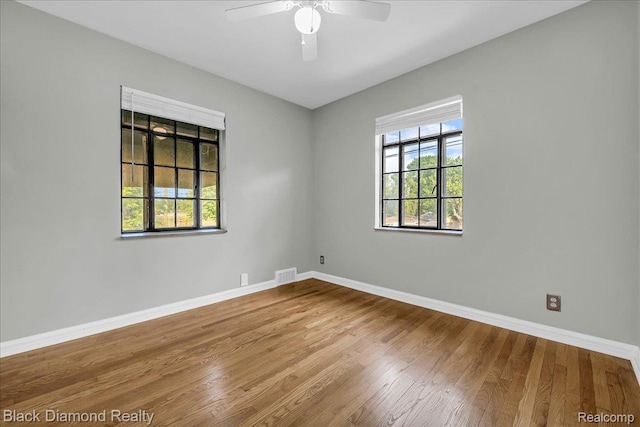 5500 Harvard Rd, Detroit, MI 48224 - unfurnished room featuring wood finished floors and ceiling fan