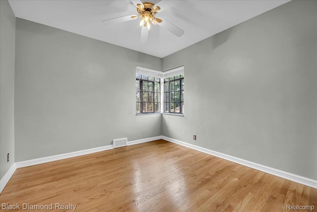 5500 Harvard Rd, Detroit, MI 48224 - empty room with light wood-style flooring and a ceiling fan