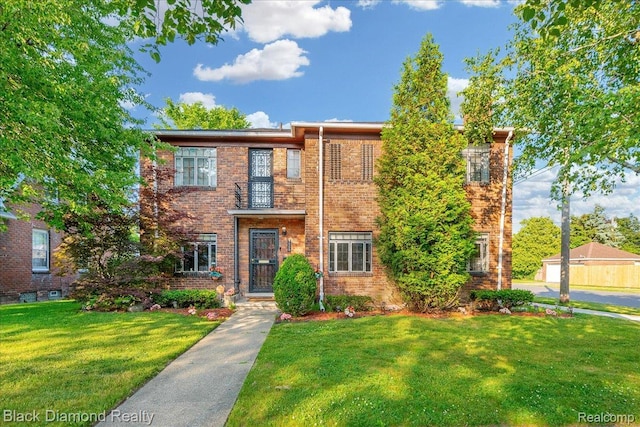 5500 Harvard Rd, Detroit, MI 48224 - view of front of property featuring a front lawn and brick siding