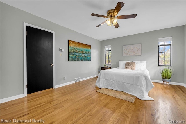 5500 Harvard Rd, Detroit, MI 48224 - bedroom with light wood-type flooring and a ceiling fan