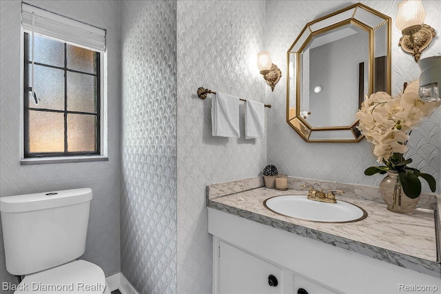5500 Harvard Rd, Detroit, MI 48224 - bathroom with wallpapered walls and vanity