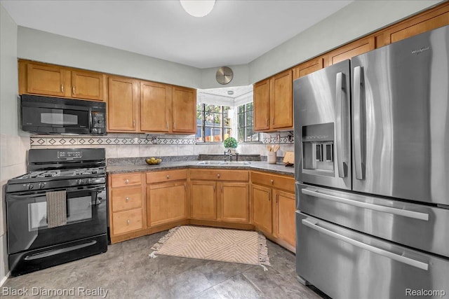 5500 Harvard Rd, Detroit, MI 48224 - kitchen featuring black appliances, dark countertops, decorative backsplash, and brown cabinets