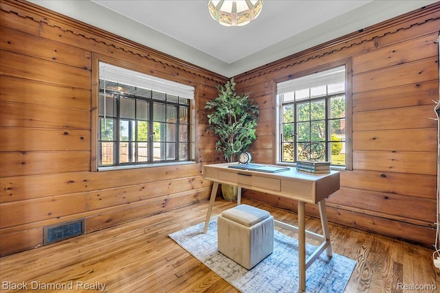 5500 Harvard Rd, Detroit, MI 48224 - office area featuring plenty of natural light, wooden walls, and wood finished floors