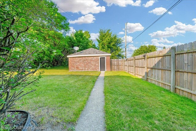 5500 Harvard Rd, Detroit, MI 48224 - view of yard with an outdoor structure