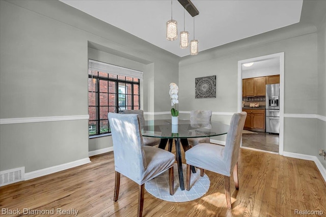 5500 Harvard Rd, Detroit, MI 48224 - dining room with light wood-style floors