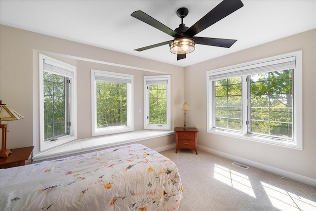 4679-4681 Forest Ridge Dr, Holland, MI 49423 - carpeted bedroom featuring baseboards and ceiling fan