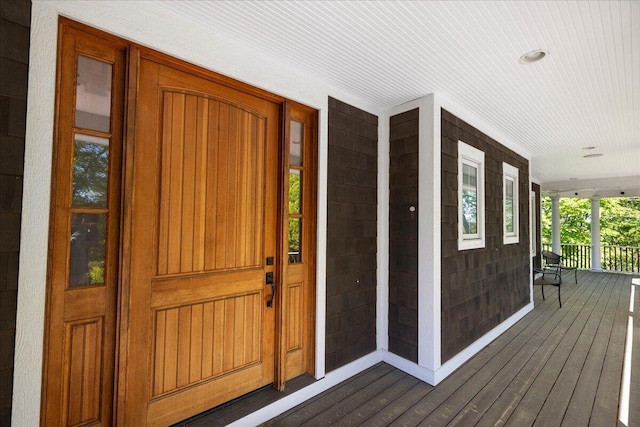 4679-4681 Forest Ridge Dr, Holland, MI 49423 - view of exterior entry with a porch