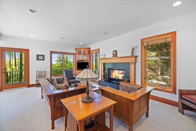 4679-4681 Forest Ridge Dr, Holland, MI 49423 - living area featuring plenty of natural light, a tile fireplace, recessed lighting, and light colored carpet