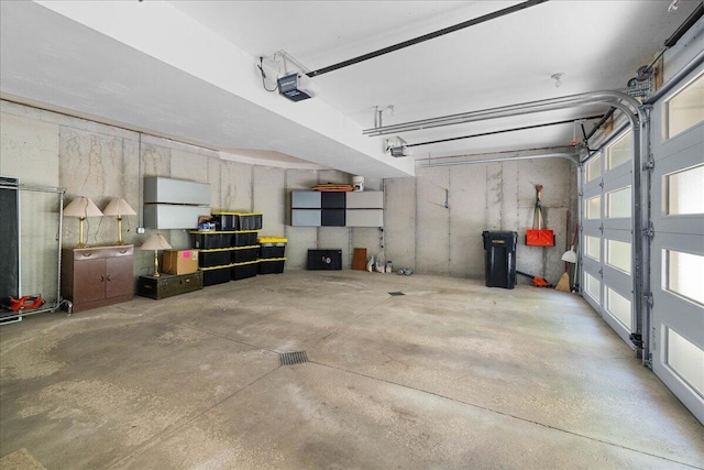 4679-4681 Forest Ridge Dr, Holland, MI 49423 - garage featuring a garage door opener