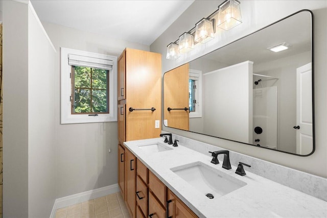 4679-4681 Forest Ridge Dr, Holland, MI 49423 - bathroom with double vanity, a shower, and tile patterned flooring