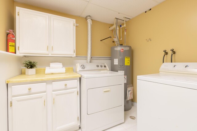 10096 S S Ave W, Michigan, MI 49071 - washroom with electric water heater, cabinet space, separate washer and dryer, and light tile patterned floors