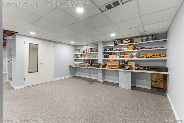 8276 Riverview St, Dearborn Heights, MI 48127 - unfurnished office with a drop ceiling, built in study area, speckle patterned floor, and recessed lighting