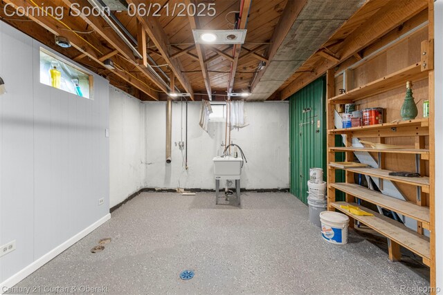 8276 Riverview St, Dearborn Heights, MI 48127 - basement featuring a sink and baseboards