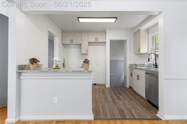 8276 Riverview St, Dearborn Heights, MI 48127 - kitchen featuring dishwasher, wood finished floors, a peninsula, and light stone countertops