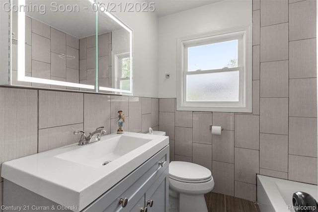 8276 Riverview St, Dearborn Heights, MI 48127 - full bathroom featuring tile walls, vanity, and a bathtub