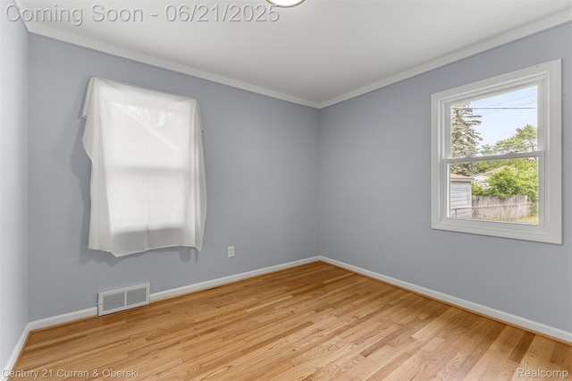 8276 Riverview St, Dearborn Heights, MI 48127 - unfurnished room with wood finished floors and ornamental molding