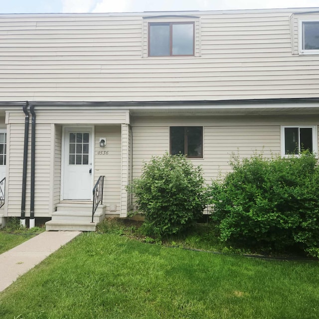 4536 Westbrook Dr Unit 46, Jackson, MI 49201 - entrance to property with a yard