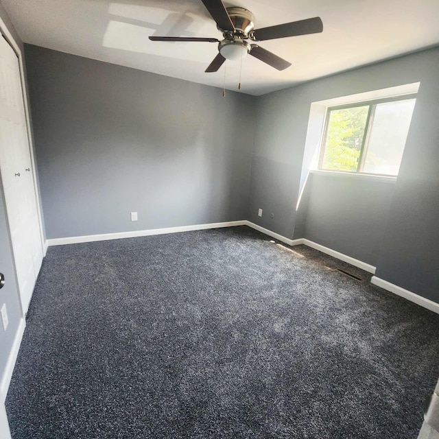 4536 Westbrook Dr Unit 46, Jackson, MI 49201 - spare room featuring a ceiling fan and carpet flooring