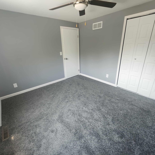 4536 Westbrook Dr Unit 46, Jackson, MI 49201 - unfurnished bedroom with carpet flooring, ceiling fan, and a closet