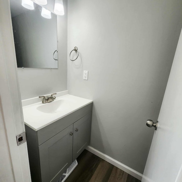 4536 Westbrook Dr Unit 46, Jackson, MI 49201 - bathroom featuring vanity and wood finished floors