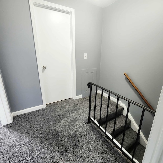 4536 Westbrook Dr Unit 46, Jackson, MI 49201 - staircase featuring carpet and baseboards