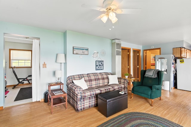 17295 Stevens Forest Lake St, Cassopolis, MI 49031 - living room featuring a ceiling fan and light wood finished floors