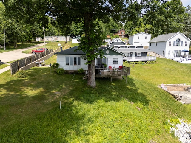 17295 Stevens Forest Lake St, Cassopolis, MI 49031 - view of yard with a deck, view of wooded area, and a residential view