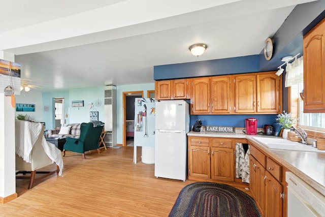 17295 Stevens Forest Lake St, Cassopolis, MI 49031 - kitchen featuring white appliances, light wood-type flooring, light countertops, and ceiling fan