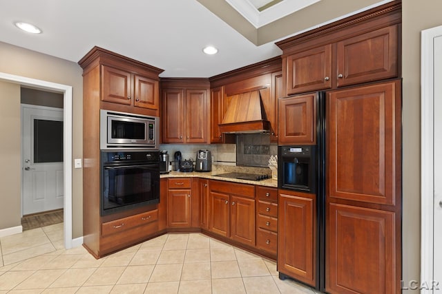 3054 Windmill Dr, Adrian, MI 49221 - kitchen featuring black appliances, custom exhaust hood, light tile patterned floors, backsplash, and light stone counters