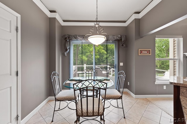 3054 Windmill Dr, Adrian, MI 49221 - dining area featuring ornamental molding, healthy amount of natural light, and light tile patterned flooring