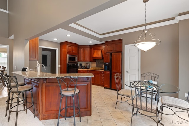 3054 Windmill Dr, Adrian, MI 49221 - kitchen with built in appliances, a breakfast bar area, a peninsula, crown molding, and premium range hood
