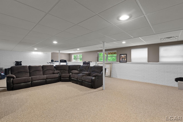 3054 Windmill Dr, Adrian, MI 49221 - living room with carpet flooring, a drop ceiling, and brick wall