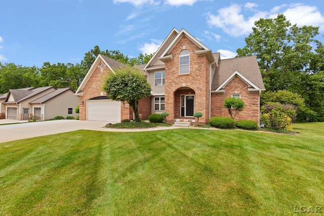 3054 Windmill Dr, Adrian, MI 49221 - view of front of house featuring brick siding, driveway, a front lawn, and an attached garage
