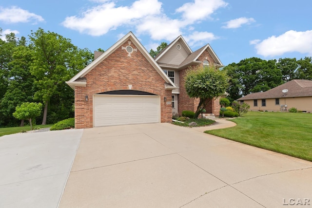3054 Windmill Dr, Adrian, MI 49221 - traditional-style home with brick siding, driveway, and a front lawn