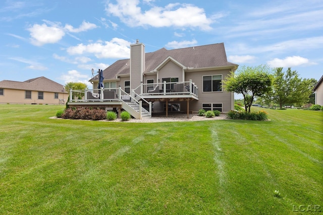 3054 Windmill Dr, Adrian, MI 49221 - rear view of house featuring a deck, a yard, a chimney, and stairway