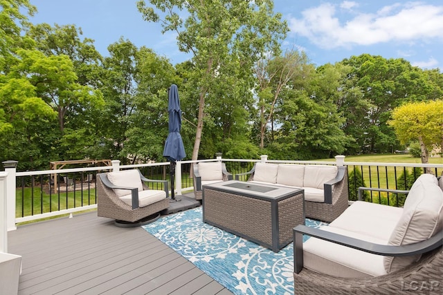 3054 Windmill Dr, Adrian, MI 49221 - deck with an outdoor living space and view of wooded area