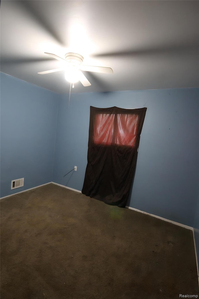 21325 Marie Ave, Warren, MI 48089 - unfurnished room with a ceiling fan and carpet