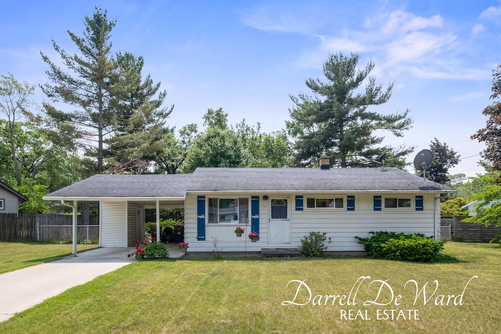 968 Kendalwood St NE, Grand Rapids, MI 49505 - single story home featuring driveway, an attached carport, and a chimney