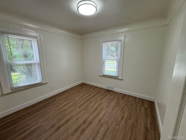 28905 Hennepin St, Dearborn Heights, MI 48135 - spare room with wood finished floors and baseboards