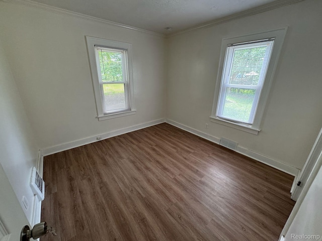 28905 Hennepin St, Dearborn Heights, MI 48135 - empty room featuring dark wood-style flooring and ornamental molding