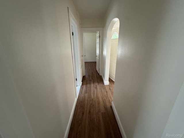 28905 Hennepin St, Dearborn Heights, MI 48135 - corridor with arched walkways and dark wood-style flooring