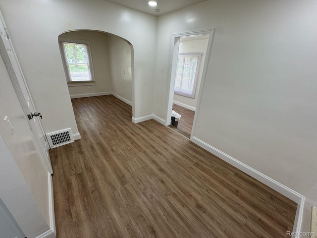 28905 Hennepin St, Dearborn Heights, MI 48135 - spare room with arched walkways, wood finished floors, plenty of natural light, and recessed lighting