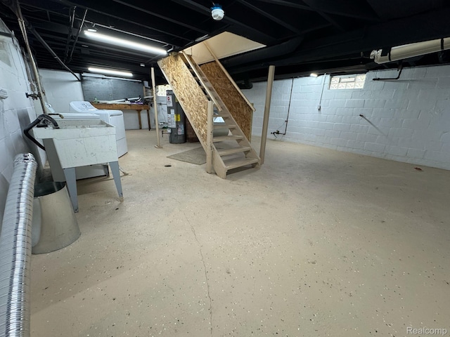 28905 Hennepin St, Dearborn Heights, MI 48135 - unfinished below grade area featuring washer / dryer, water heater, and stairs