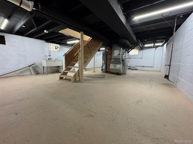 28905 Hennepin St, Dearborn Heights, MI 48135 - unfinished basement with stairs, heating unit, washer / dryer, and gas water heater