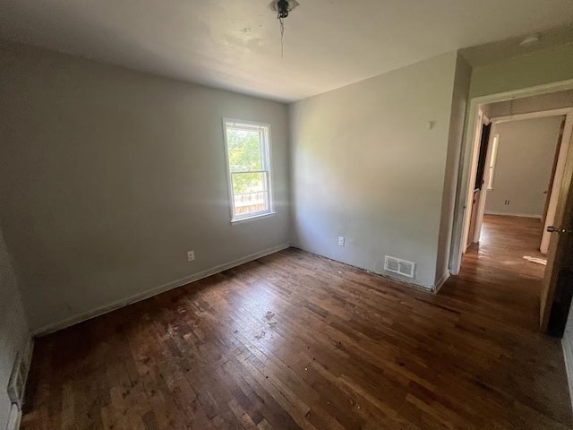 3501 Fleming Rd, Flint, MI 48504 - unfurnished room featuring wood finished floors and baseboards