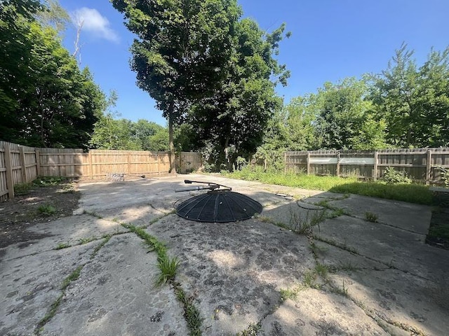 3501 Fleming Rd, Flint, MI 48504 - fenced backyard featuring a patio