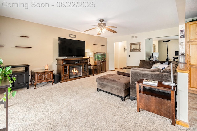 9300 Clippert St, Taylor, MI 48180 - carpeted living area featuring ceiling fan and a glass covered fireplace