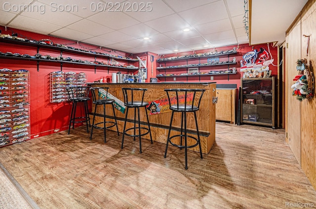9300 Clippert St, Taylor, MI 48180 - indoor dry bar with wood finished floors and a drop ceiling
