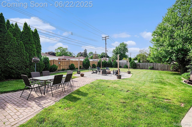 9300 Clippert St, Taylor, MI 48180 - fenced backyard featuring a patio area and an outdoor fire pit