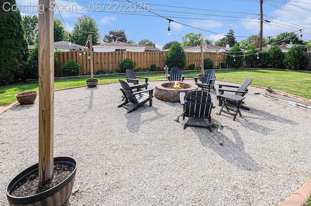 9300 Clippert St, Taylor, MI 48180 - view of patio / terrace featuring a fire pit